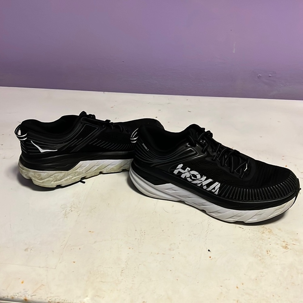 Womens black Hoka shoes.  Size 8